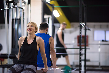 Image showing athletes working out their arms