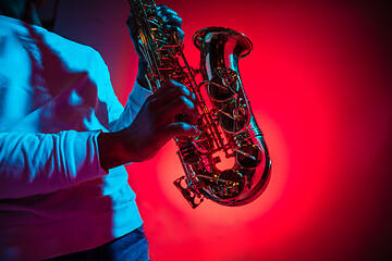 Image showing African American jazz musician playing the saxophone.