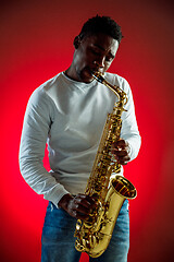 Image showing African American jazz musician playing the saxophone.