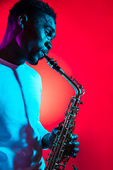 Image showing African American jazz musician playing the saxophone.