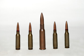 Image showing five machine gun cartridges