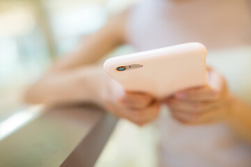 Image showing Woman hand hold with cellphone