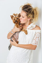 Image showing Girl with yorkie dog