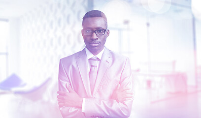 Image showing Young businessman in his office