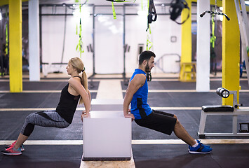 Image showing athletes working out their arms