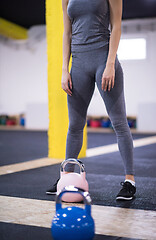 Image showing woman exercise with fitness kettlebell