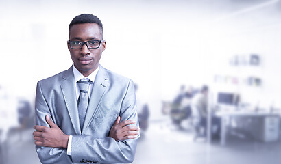 Image showing Young businessman in his office