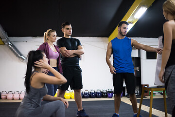 Image showing athletes getting instructions from trainer