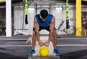 Image showing man exercise with fitness kettlebell