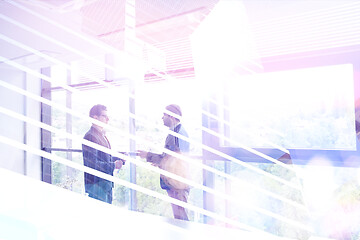 Image showing cloasing the deal in modern office interior