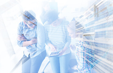 Image showing group of Business People Working With Tablet in startup office