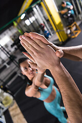 Image showing young athletes making high five