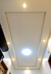 Image showing Original stylish multi-level ceiling in the hallway of the apartment