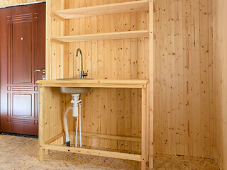 Image showing Small homemade kitchen in the interior of a country house