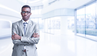 Image showing Young businessman in his office