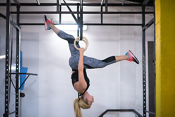 Image showing woman working out on gymnastic rings