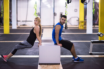 Image showing athletes working out their arms