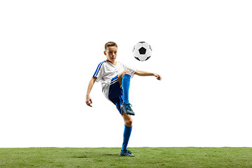 Image showing Young boy with soccer ball isolated on white. football player