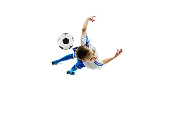 Image showing Young boy with soccer ball isolated on white. football player