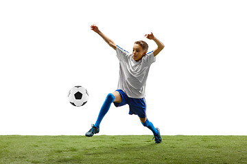 Image showing Young boy with soccer ball isolated on white. football player