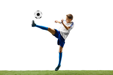 Image showing Young boy with soccer ball isolated on white. football player