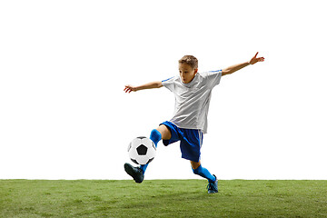 Image showing Young boy with soccer ball isolated on white. football player