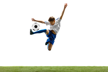 Image showing Young boy with soccer ball isolated on white. football player