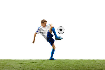 Image showing Young boy with soccer ball isolated on white. football player