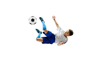 Image showing Young boy with soccer ball isolated on white. football player