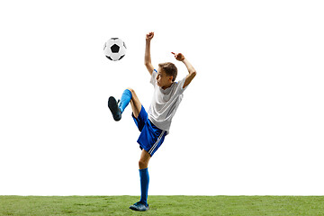 Image showing Young boy with soccer ball isolated on white. football player