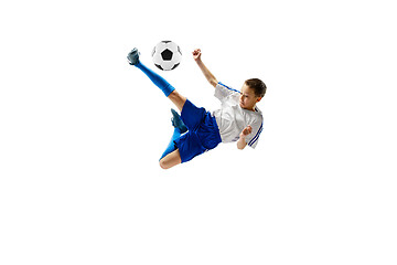 Image showing Young boy with soccer ball isolated on white. football player