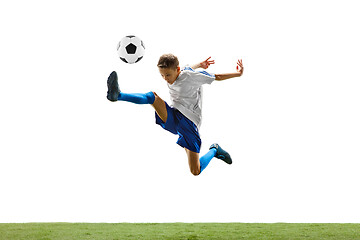 Image showing Young boy with soccer ball isolated on white. football player