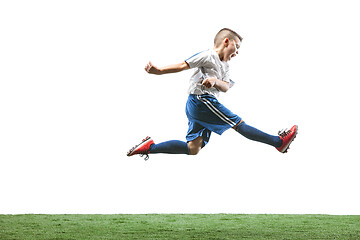 Image showing Young boy with soccer ball isolated on white. football player