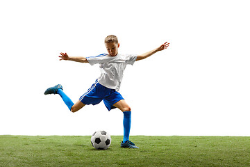 Image showing Young boy with soccer ball isolated on white. football player