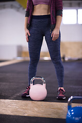 Image showing woman exercise with fitness kettlebell