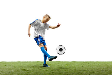 Image showing Young boy with soccer ball isolated on white. football player