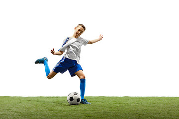 Image showing Young boy with soccer ball isolated on white. football player