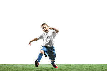 Image showing Young boy with soccer ball isolated on white. football player