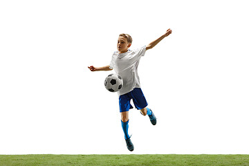 Image showing Young boy with soccer ball isolated on white. football player