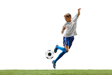 Image showing Young boy with soccer ball isolated on white. football player