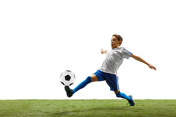 Image showing Young boy with soccer ball isolated on white. football player