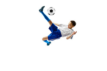 Image showing Young boy with soccer ball isolated on white. football player