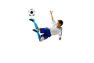 Image showing Young boy with soccer ball isolated on white. football player