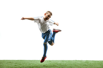 Image showing Professional football soccer player with ball isolated on white background