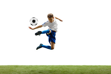 Image showing Young boy with soccer ball isolated on white. football player