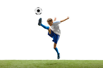 Image showing Young boy with soccer ball isolated on white. football player