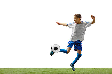 Image showing Young boy with soccer ball isolated on white. football player