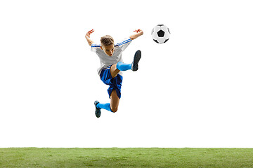 Image showing Young boy with soccer ball isolated on white. football player