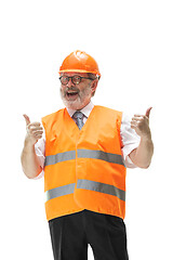 Image showing The builder in orange helmet isolated on white