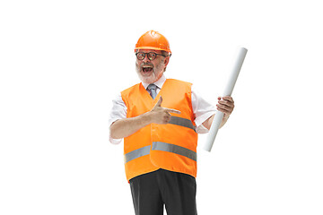 Image showing The builder in orange helmet isolated on white